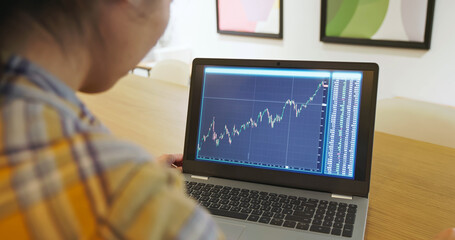 woman happy about stock uptrend