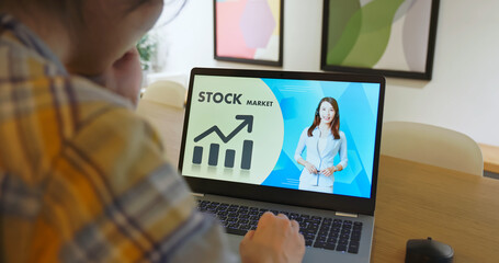 woman learns investments online