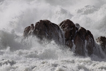 Boulder hit by stormy sea