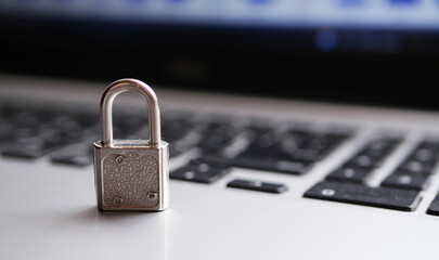 Lock on laptop keyboard. Internet security banner. Cyber safety concept 