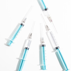 medical disposable plastic syringe for injection in the hospital isolated on a white background