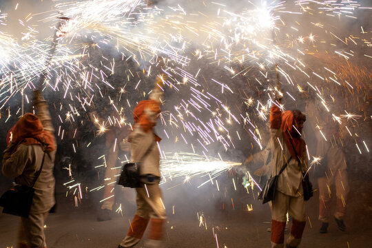Correfoc Festival, People With Firework At Night During Event, Catalonia, Spain