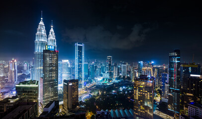 Fototapeta na wymiar Panorama aerial night view of Kuala Lumpur city skyline. Malaysia. Blue mode