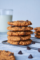 Pile of homemade oatmeal and banana cookies with chocolate chips