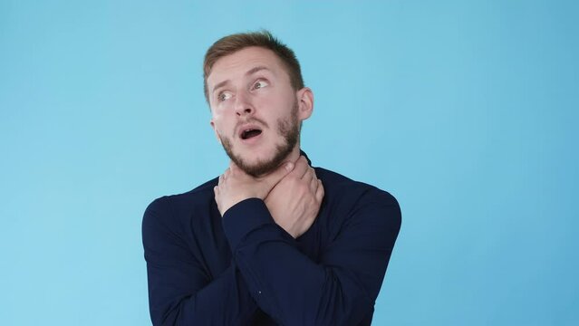 Choking man. Suicide gesture. Life trouble. Boomerang motion. Frustrated suffocate guy with hands clenched on neck isolated on blue background GIF loop motion.