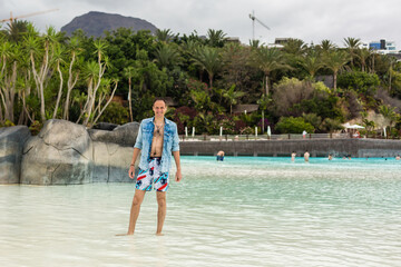 Tourists enjoy water attractions in Siam waterpark in Tenerife, Spain. The Siam is the largest water theme park in Europe.