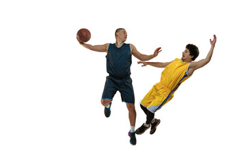 Fototapeta na wymiar Top view of two young basketball players training with ball isolated on white studio background. Motion, activity, sport concepts.