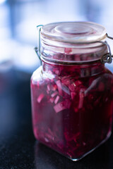 Photographie macro d'un bocal de vinaigre