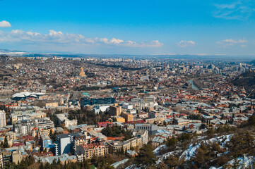 Panoramic view of the snow-covered city of Tbilisi spring