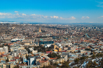 Panoramic view of the snow-covered city of Tbilisi spring