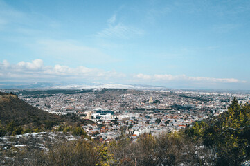 Panoramic view of the snow-covered city of Tbilisi spring