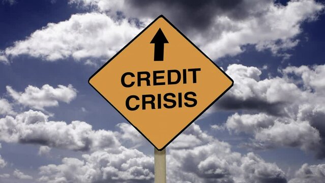 Money credit and financial problems. Zoom in to a Credit Crisis road sign with time lapse clouds background.