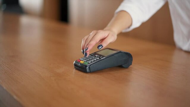 Payment by phone using NFC technology at the terminal in the store