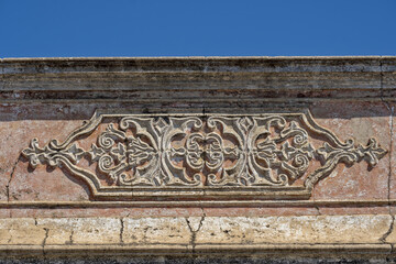 old traditional pediment from the Algarve in Tavira, Portugal
