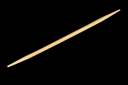 Toothpick one black background close-up
