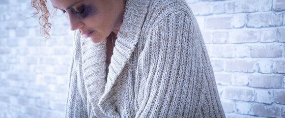 Side view of adult woman with black bruise on eye after fight and violence at home. Bad violent...