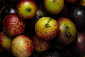 Fruits of Camu Camu (Myrciaria dubia), grows on the banks of the rivers of the Amazon, is very common in the markets, also used for the preparation of soft drinks, desserts and liqueurs, has a very pl