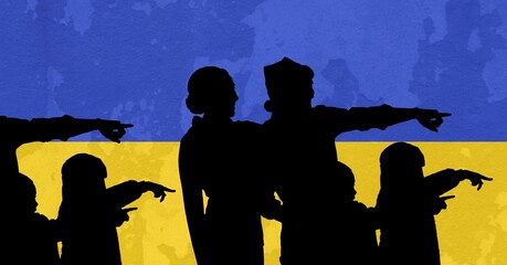 Silhouette of group of people pointing in a direction against ukrainian flag in background