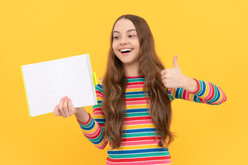 Fully satisfied with schooling. Happy girl give thumbs up holding open book. Get your schooling