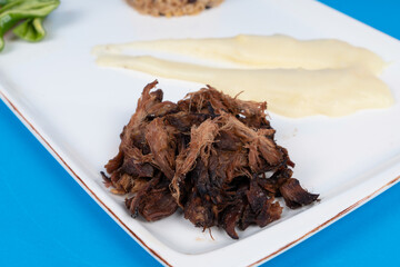 Cropped view of meat tandoori food shot on white background in isolated environment.