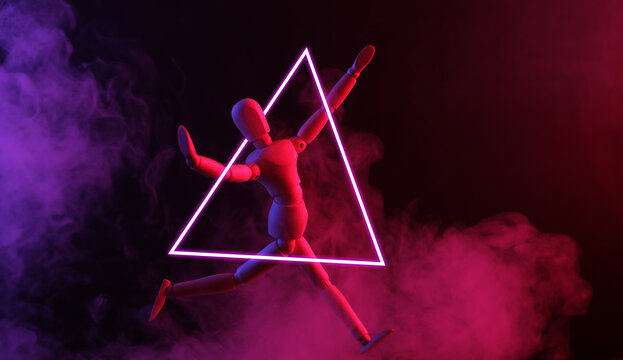 Happy wooden pupppet in glowing triangle, dense smoke with red-purple neon light. - Powered by Adobe