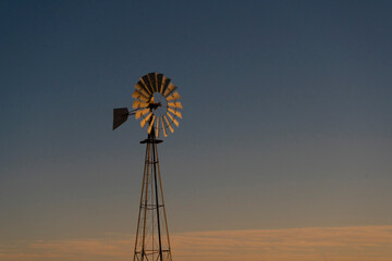A traditional ranch windmill in rural Texas - obrazy, fototapety, plakaty