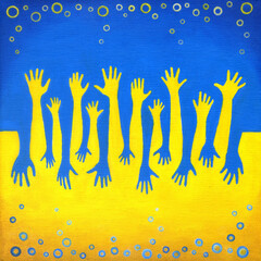 Le mani gialle e blu sulla bandiera ucraina, saluto in guerra	
