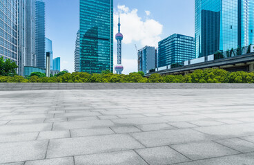 Fototapeta na wymiar modern buildings and empty pavement in china
