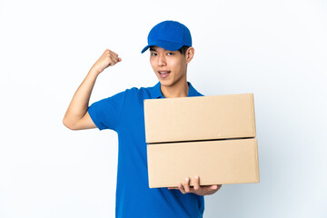 Delivery Chinese man isolated on white background doing strong gesture