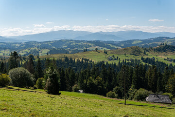 Beautiful landscape of nature, mountains and forest in rural area on a sunny summer day