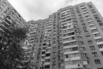 Fototapeta premium Tall apartment building on the outskirts of the city of Kyiv