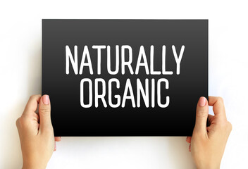 Naturally Organic - foods are grown without artificial pesticides, fertilizers, or herbicides, text on card concept background