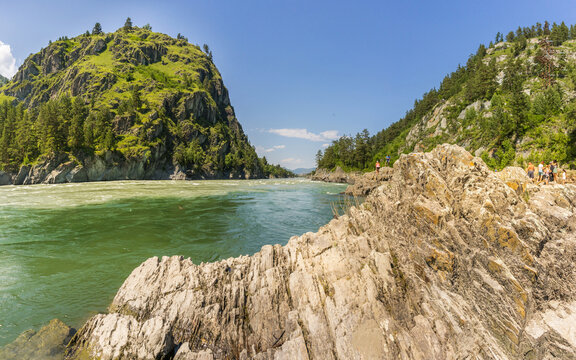 Rock, turquoise water of the Katun river and mountains