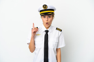 Airplane blonde woman pilot isolated on white background intending to realizes the solution while lifting a finger up