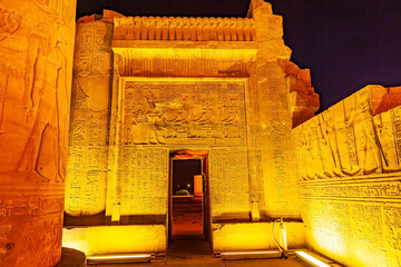Relief and Hieroglyph on the wall in The Temple of Sobek and Horus in the night.
