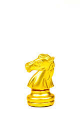 Gold knight chess figure isolated on white background. Chess is a game of war to fight with...