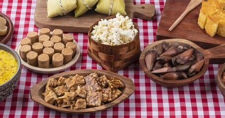 Typical brazilian june festival food over plaid fabric. Festa junina.