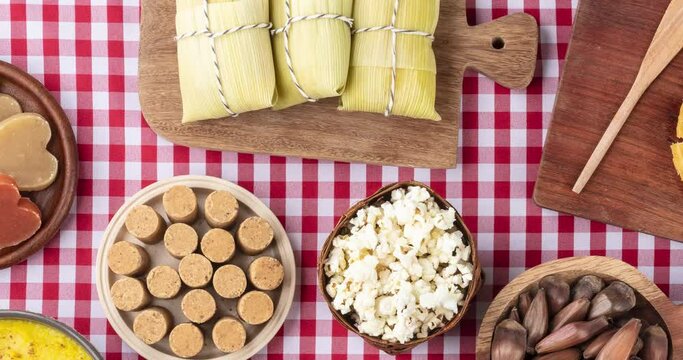 Typical brazilian june festival food over plaid fabric. Festa junina