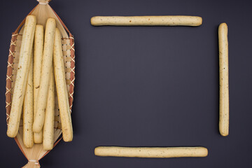Breadsticks on dark background