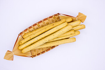 Breadsticks on light background