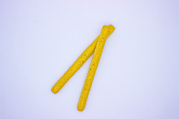 Breadsticks on light background