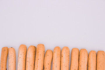 Breadsticks on light background