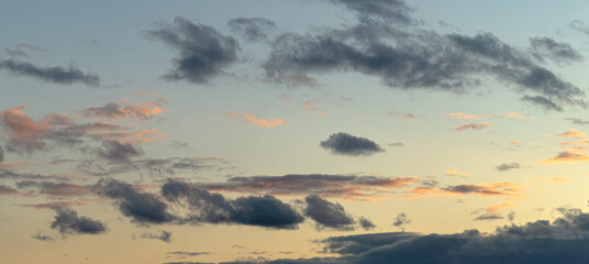 Little clouds at the evening. Yellow skies