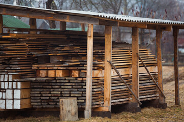 Obraz premium Detail wooden planks. Air-drying timber stack. Wood air drying, seasoning lumber or wood seasoning.