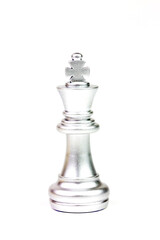 Silver king chess figure isolated on white background. Chess is a game of war to fight with strategy between two players.