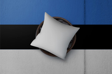 Patriotic pillow mock up on background in colors of national flag. Estonia