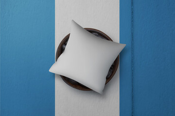 Patriotic pillow mock up on background in colors of national flag. Guatemala