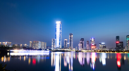 Office building reflected in the water at night