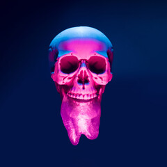 Skull with neon lights and slime floating over the black background. Cyber death concept.