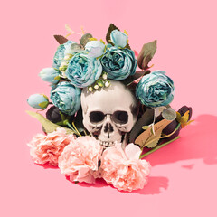 Colorful flowers bouquet with human skull in the center. Tattoo, contrast conceptual background.